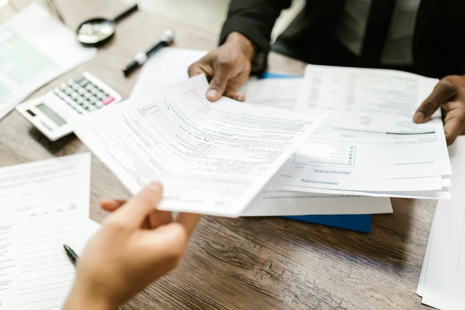 Trade compliance documents reviewed on a corporate desk